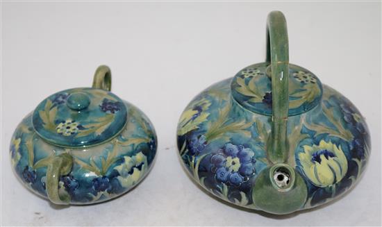 A Moorcroft late Florian tea kettle and cover, and a matching sugar bowl and cover, c.1915, teapot 16.5cm, both with repairs